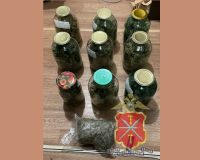 Оперативники нашли у туляка 15 трёхлитровых банок и 8 ведер с травкой